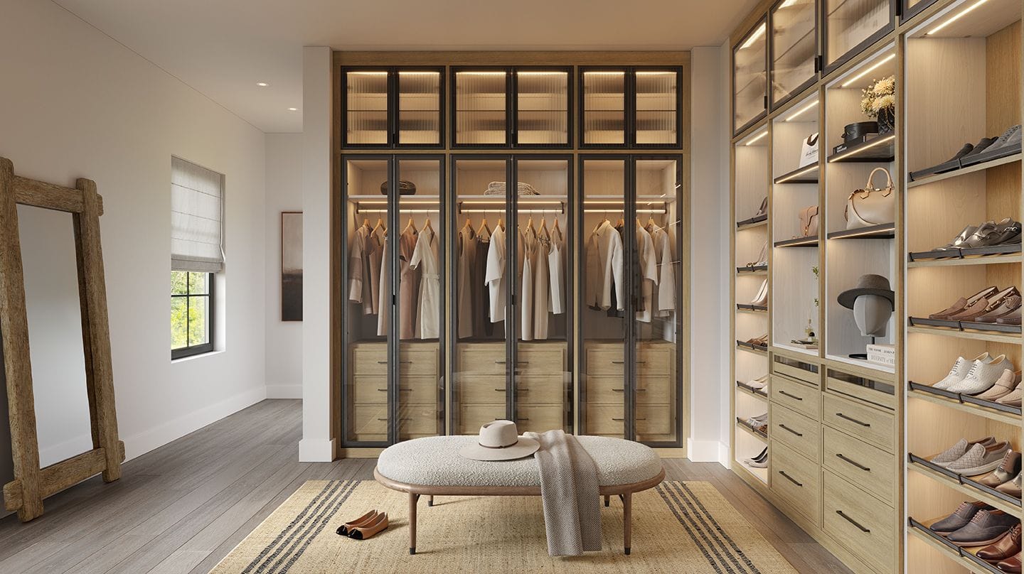 Wardrobe closet design with built in custom cabinets, shelving and shoe organizers created by California Closets