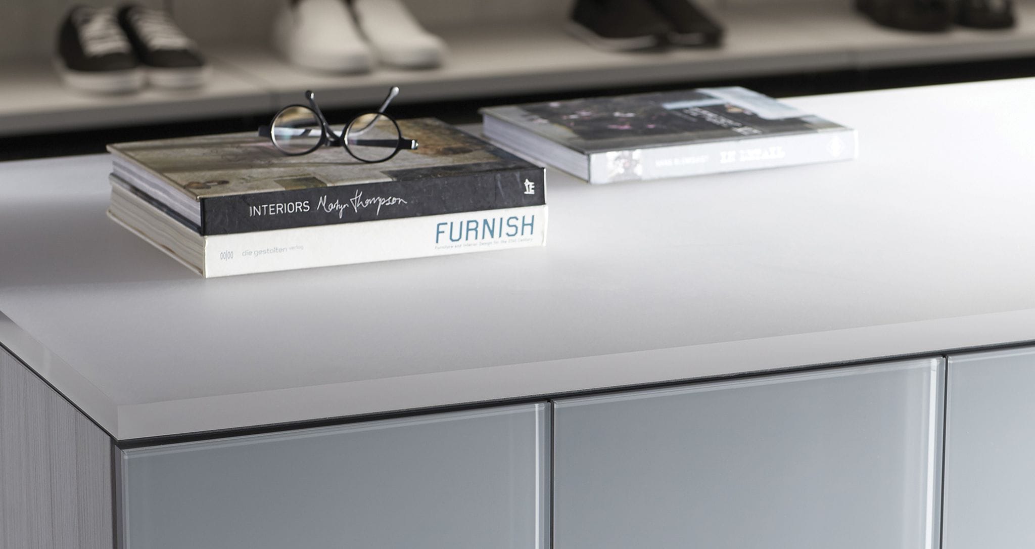 Close up of storage drawers and countertop design by California Closets