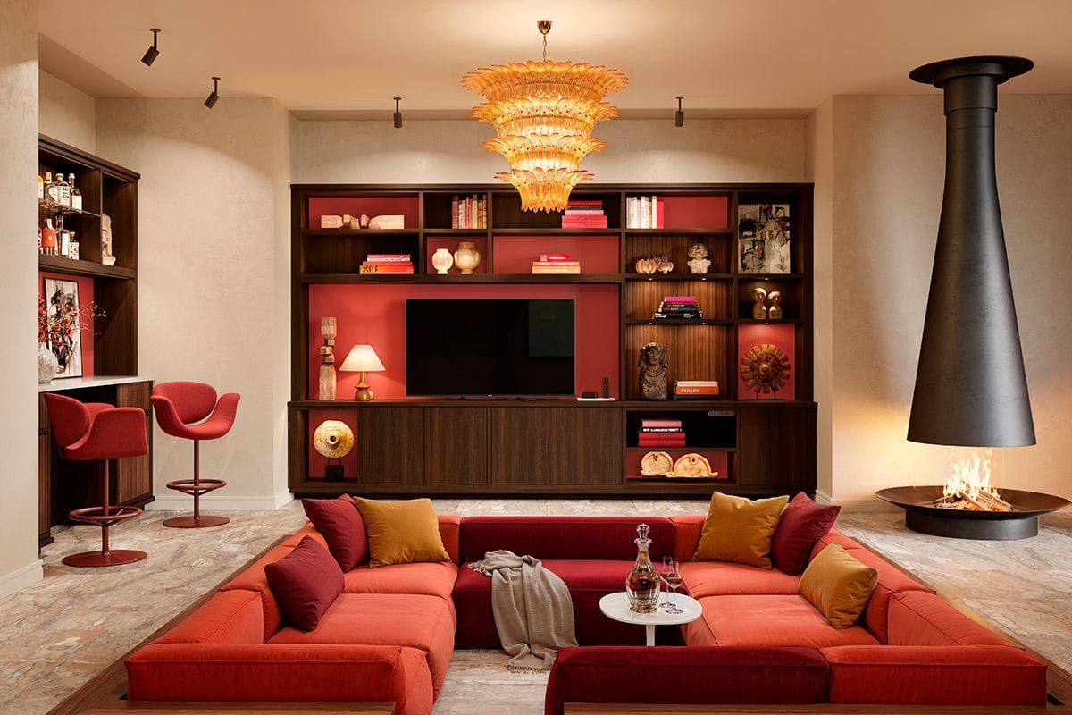 Sasha Bikoff's living room design with built in entertainent center, shelving and cabinets by California Closets
