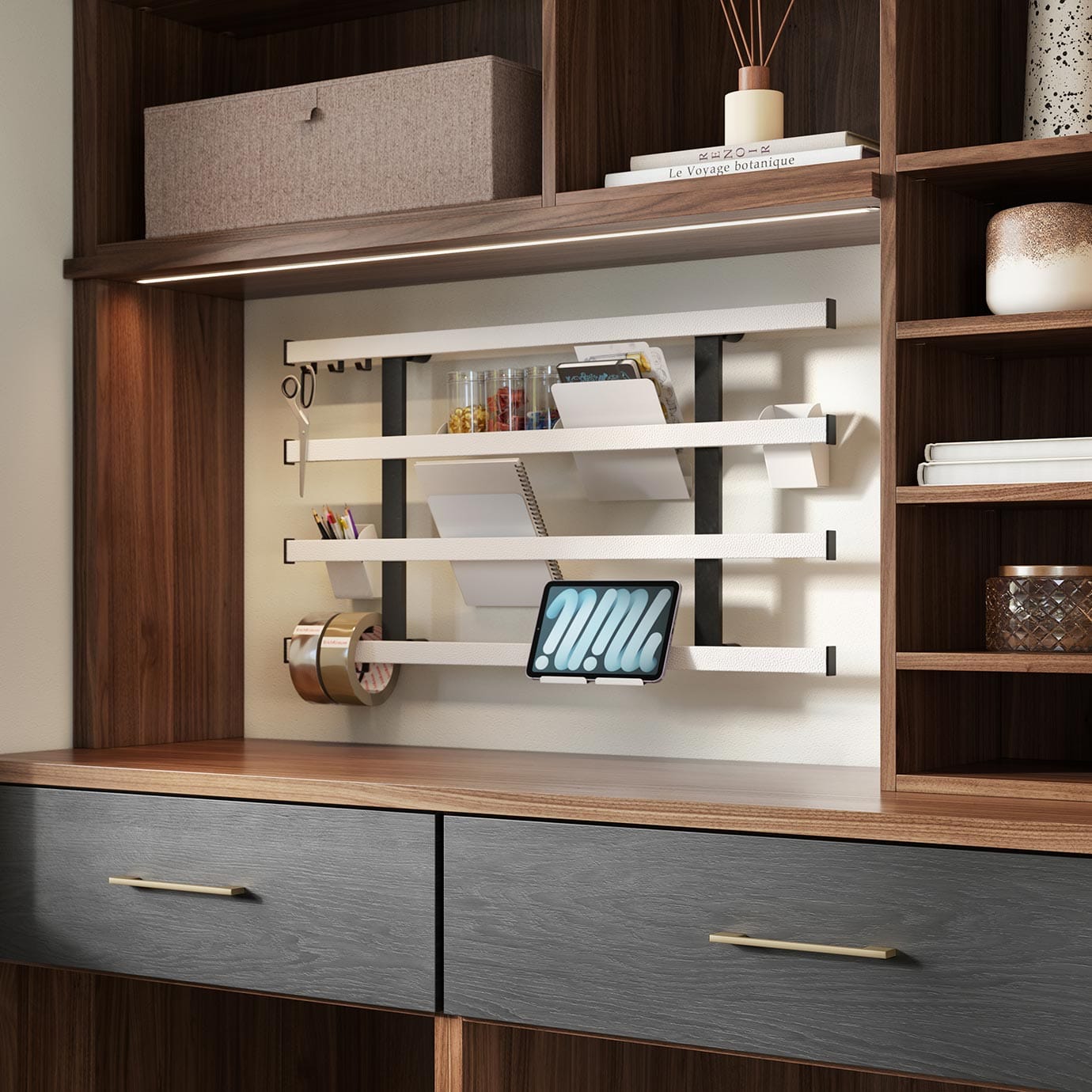Custom mudroom with wall organizer and shelving drawers by California Closets